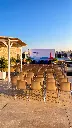 Terrazza sul mare con palco e letture.webp
